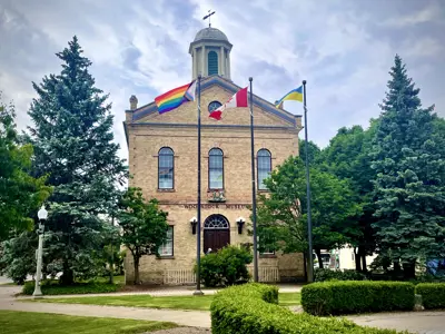 Exterior of the Woodstock Museum with Pride flag